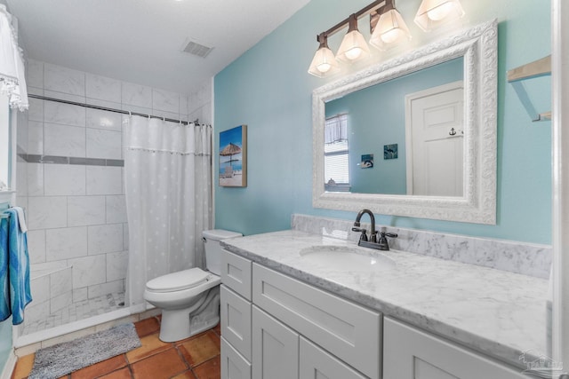 bathroom featuring tile patterned flooring, toilet, curtained shower, vanity, and a textured ceiling