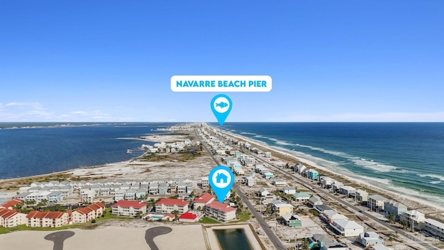 bird's eye view featuring a beach view and a water view