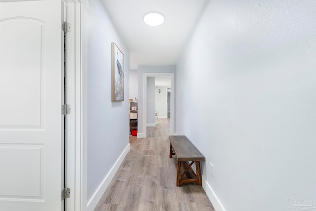 hall featuring light wood-type flooring