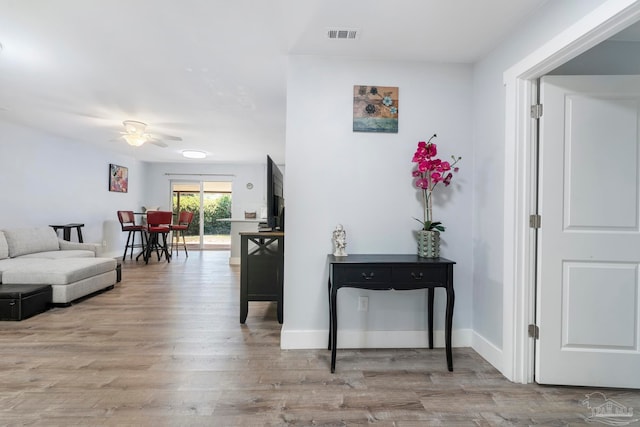 hallway featuring light hardwood / wood-style floors