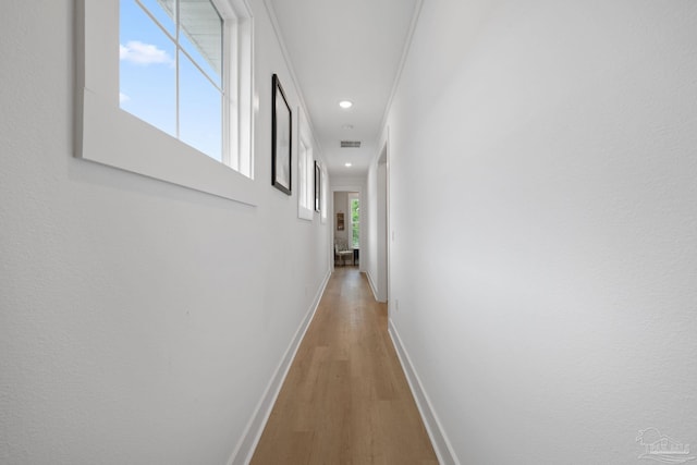 1550 W Romana St, Pensacola, FL 32502 - corridor featuring light wood-type flooring, baseboards, and recessed lighting