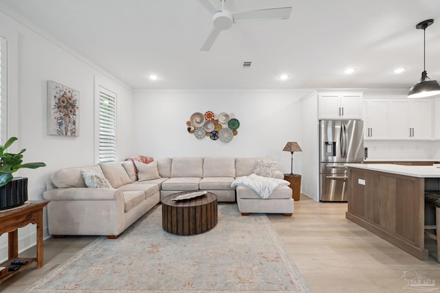 1550 W Romana St, Pensacola, FL 32502 - living room featuring light wood-style flooring, recessed lighting, ceiling fan, and crown molding