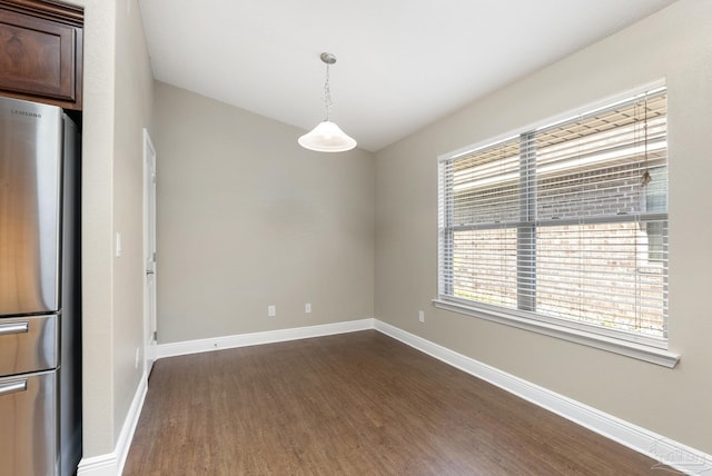 unfurnished room featuring dark hardwood / wood-style floors