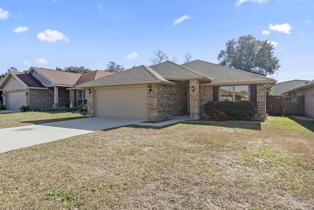 ranch-style home with a front yard and a garage