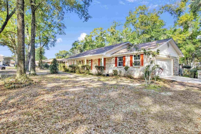 single story home with a garage