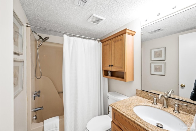 full bathroom with shower / bath combo, toilet, a textured ceiling, and vanity