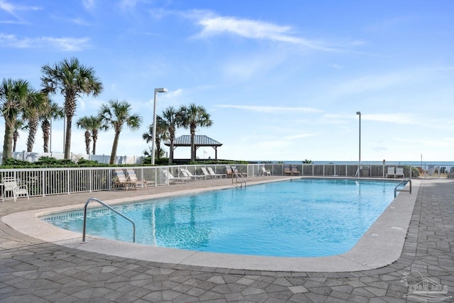 view of pool featuring a patio area