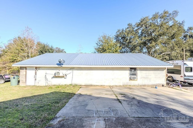 view of property exterior with a lawn