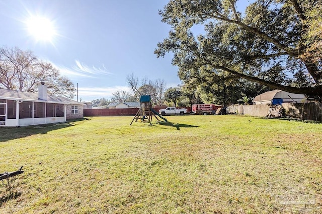 view of yard with a playground