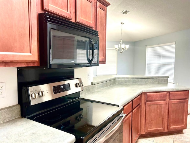 kitchen featuring stainless steel electric range, a textured ceiling, an inviting chandelier, light tile patterned flooring, and hanging light fixtures