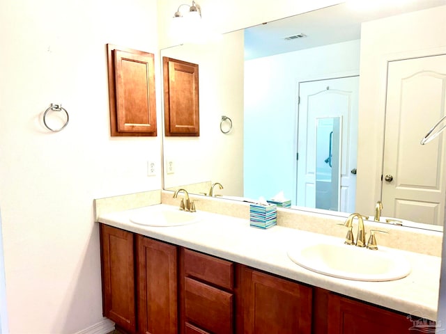 bathroom featuring double sink vanity