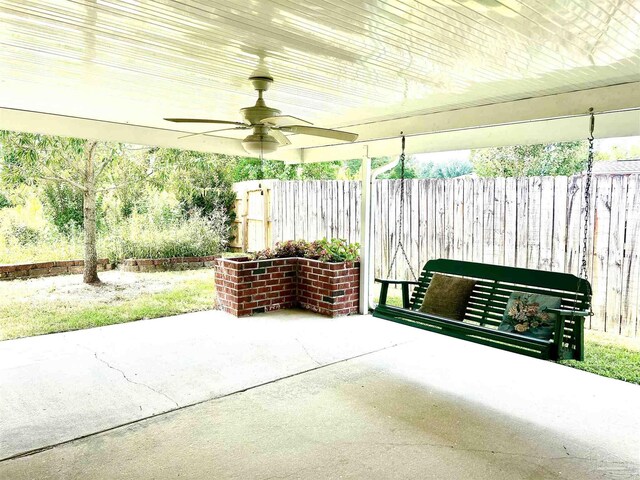 view of patio / terrace featuring ceiling fan