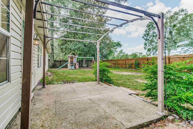 view of patio with a playground