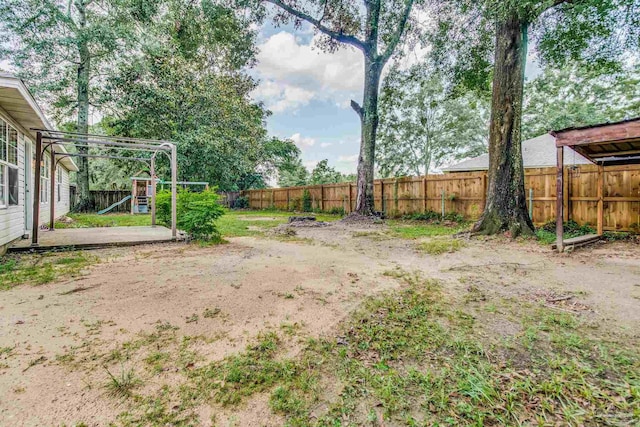 view of yard with a playground