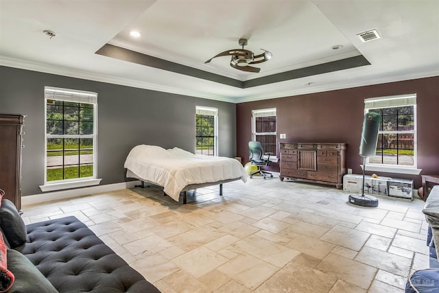 bedroom featuring a raised ceiling, multiple windows, crown molding, and ceiling fan