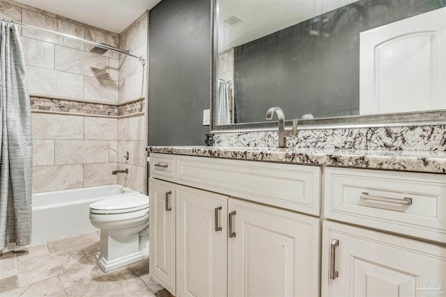 full bathroom featuring vanity, toilet, and shower / bathtub combination with curtain