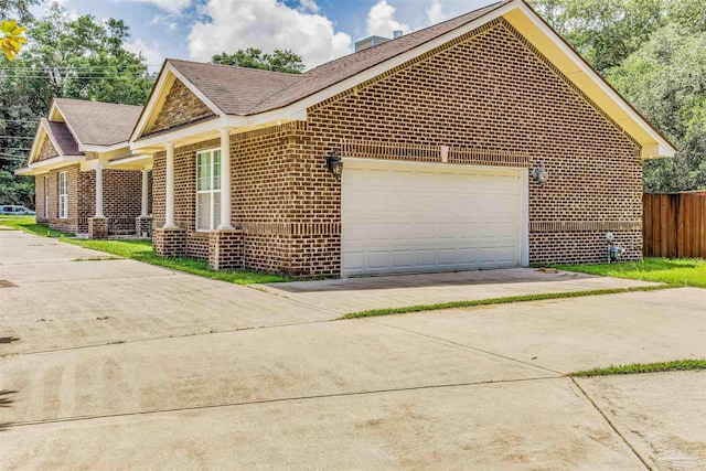 view of home's exterior with a garage