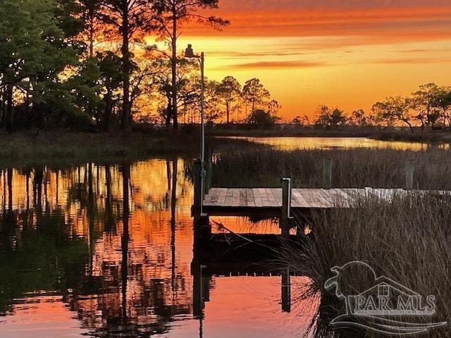 view of dock with a water view