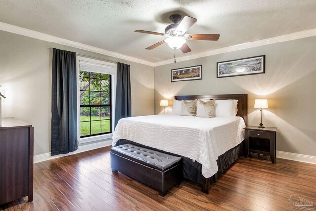 3905 Tiger Point Blvd, Gulf Breeze, FL 32563 - bedroom with wood finished floors, ornamental molding, baseboards, and ceiling fan