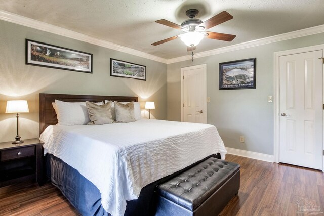 3905 Tiger Point Blvd, Gulf Breeze, FL 32563 - bedroom featuring wood finished floors, crown molding, baseboards, and ceiling fan