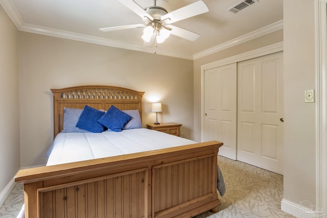 3905 Tiger Point Blvd, Gulf Breeze, FL 32563 - bedroom with a closet, crown molding, light carpet, ceiling fan, and baseboards