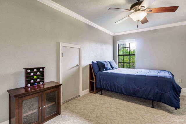 3905 Tiger Point Blvd, Gulf Breeze, FL 32563 - bedroom featuring lofted ceiling, ornamental molding, light carpet, baseboards, and ceiling fan