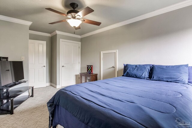 3905 Tiger Point Blvd, Gulf Breeze, FL 32563 - carpeted bedroom featuring ornamental molding, baseboards, and a ceiling fan