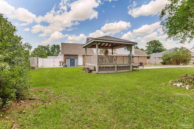 3905 Tiger Point Blvd, Gulf Breeze, FL 32563 - back of property featuring a gazebo and roof with shingles