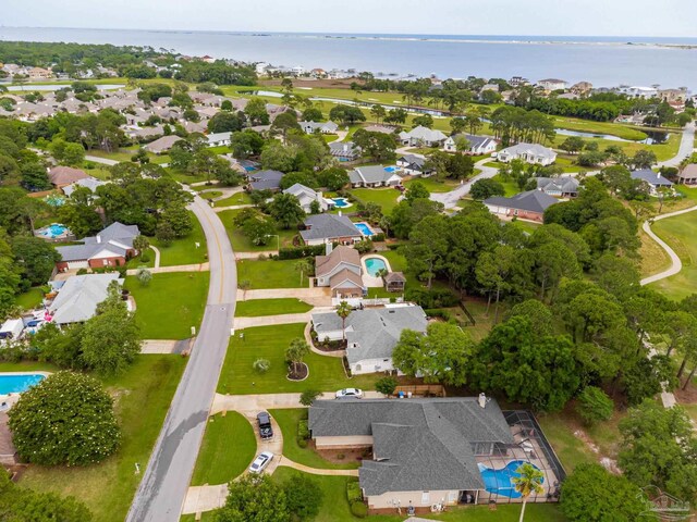 3905 Tiger Point Blvd, Gulf Breeze, FL 32563 - aerial perspective of suburban area featuring a large body of water and a pool area