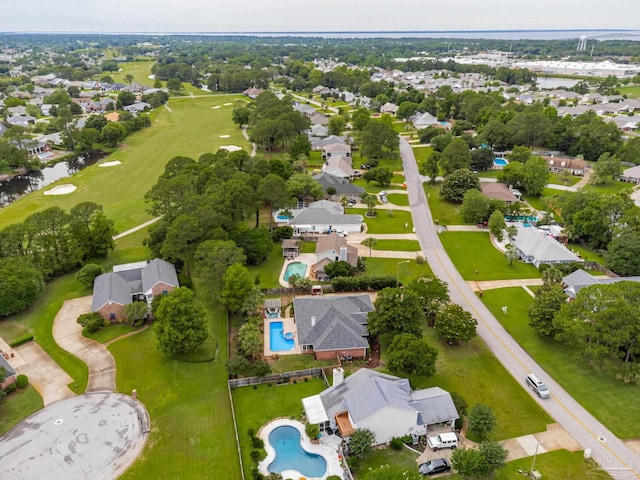 3905 Tiger Point Blvd, Gulf Breeze, FL 32563 - aerial perspective of suburban area featuring a pool, a large body of water, and a golf course