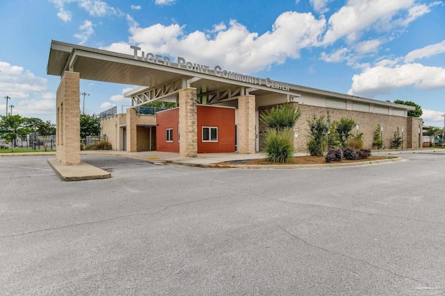 3905 Tiger Point Blvd, Gulf Breeze, FL 32563 - view of property with a parking lot