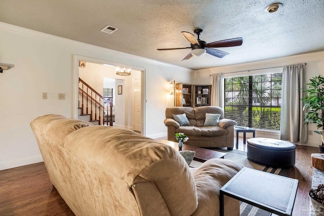 3905 Tiger Point Blvd, Gulf Breeze, FL 32563 - living room with baseboards, wood finished floors, ceiling fan, stairs, and crown molding