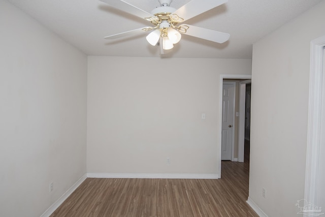 unfurnished room with wood-type flooring and ceiling fan