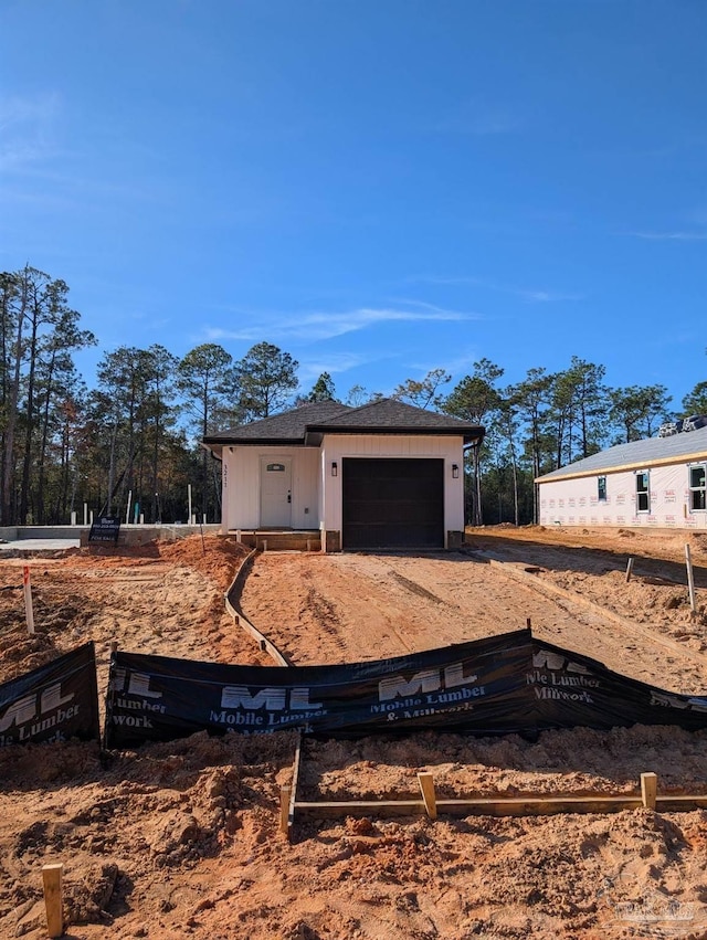 exterior space with a garage