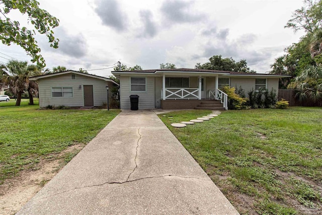 single story home with a front yard