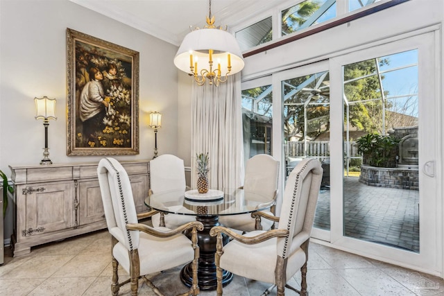 dining area featuring crown molding and a chandelier