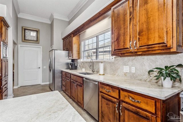 kitchen featuring appliances with stainless steel finishes, decorative backsplash, sink, light tile patterned flooring, and light stone counters