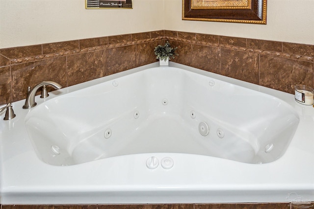 interior details featuring tiled bath