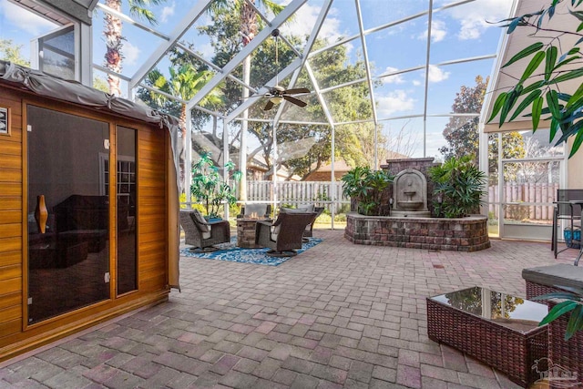 view of patio with a lanai