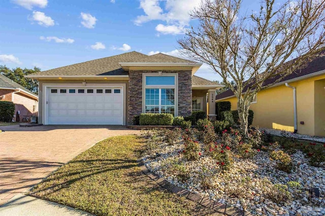 view of front of home with a garage