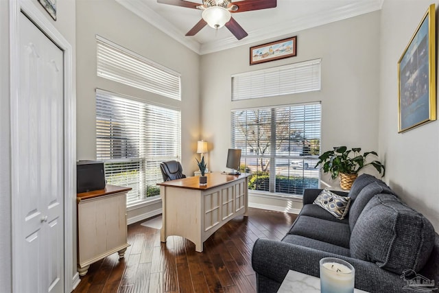 home office featuring ceiling fan, dark wood-type flooring, and crown molding