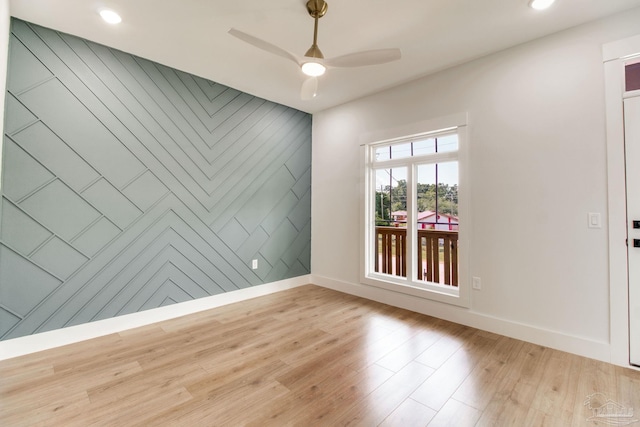 608 E Leonard Unit A & B, Pensacola, FL 32503 - empty room with baseboards, light wood-type flooring, an accent wall, ceiling fan, and recessed lighting