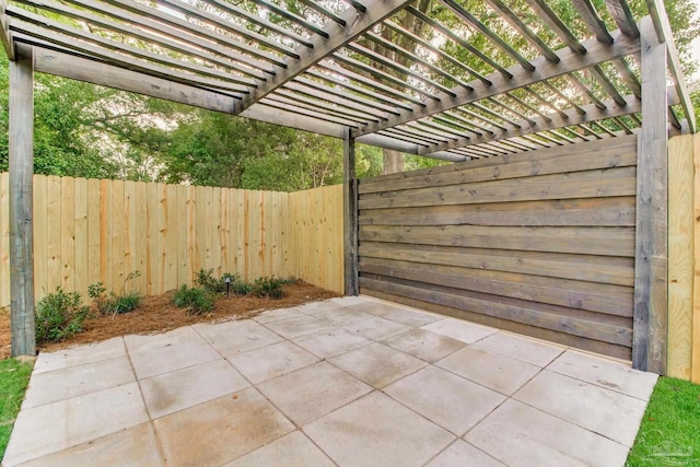 608 E Leonard Unit A & B, Pensacola, FL 32503 - fenced backyard featuring a patio area and a pergola