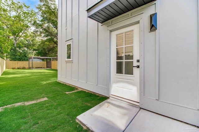 608 E Leonard Unit A & B, Pensacola, FL 32503 - view of exterior entry featuring board and batten siding
