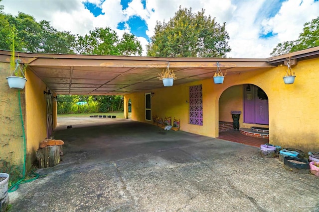 view of parking featuring a carport