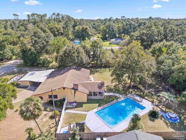 view of pool featuring a yard and a patio area