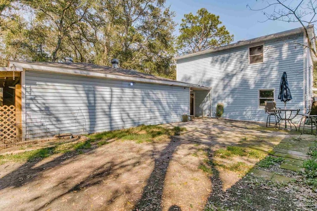 back of house featuring a patio area