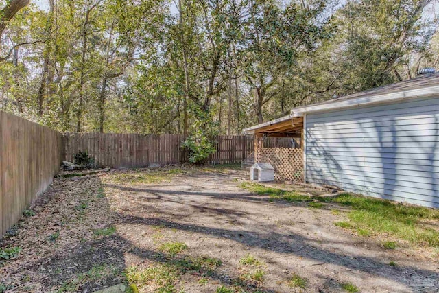 view of yard with a fenced backyard