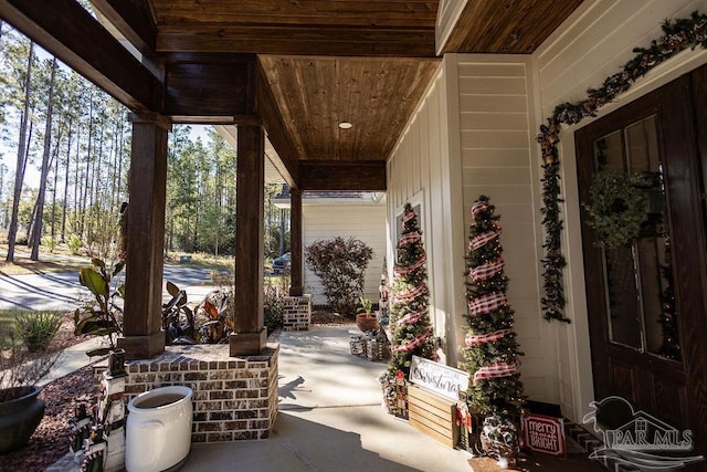 view of patio featuring a porch