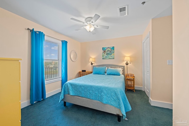 carpeted bedroom with ceiling fan